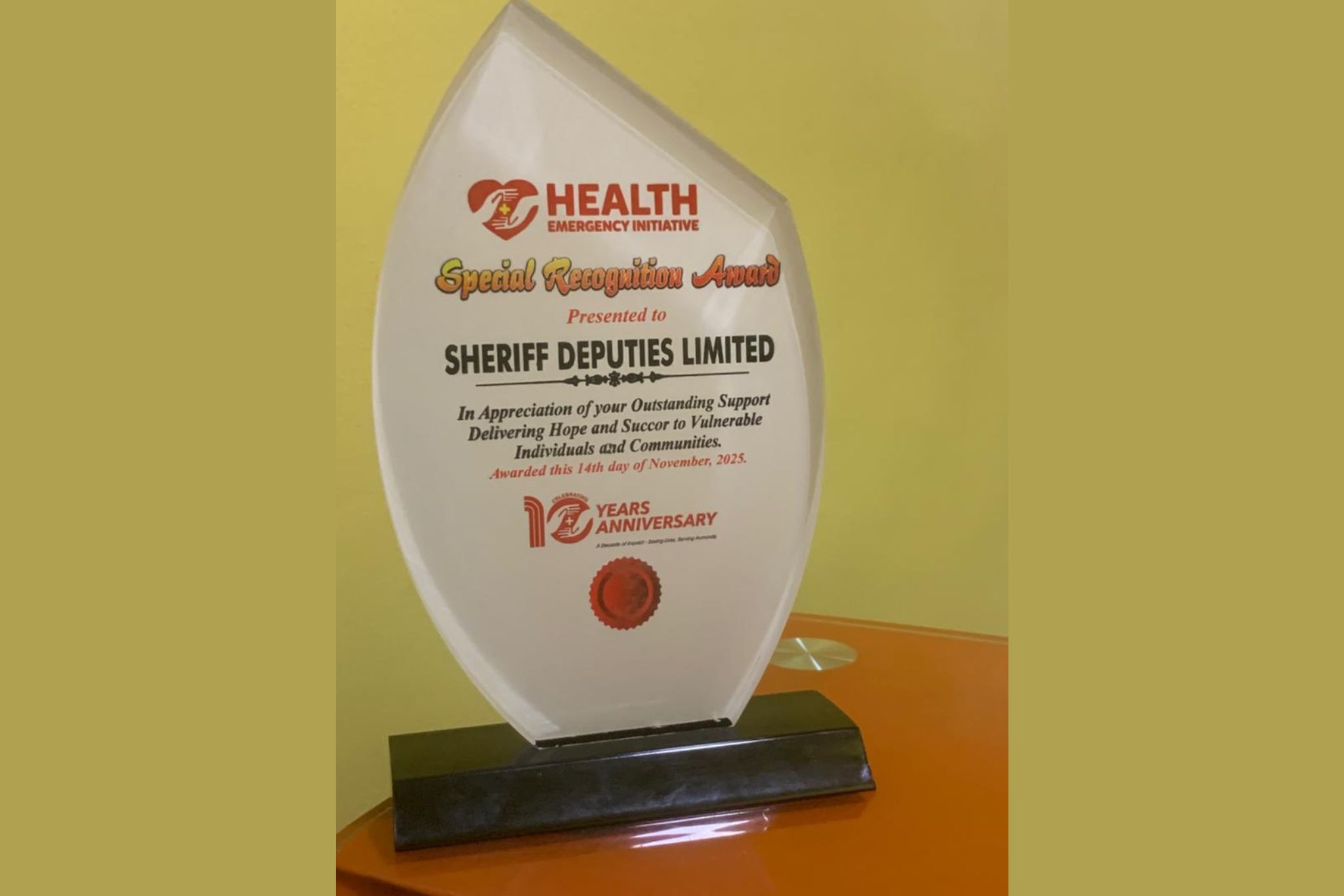 Sheriff Deputies Limited Honoured by Health Emergency Initiative for Outstanding Humanitarian Support at 10th Anniversary Celebration